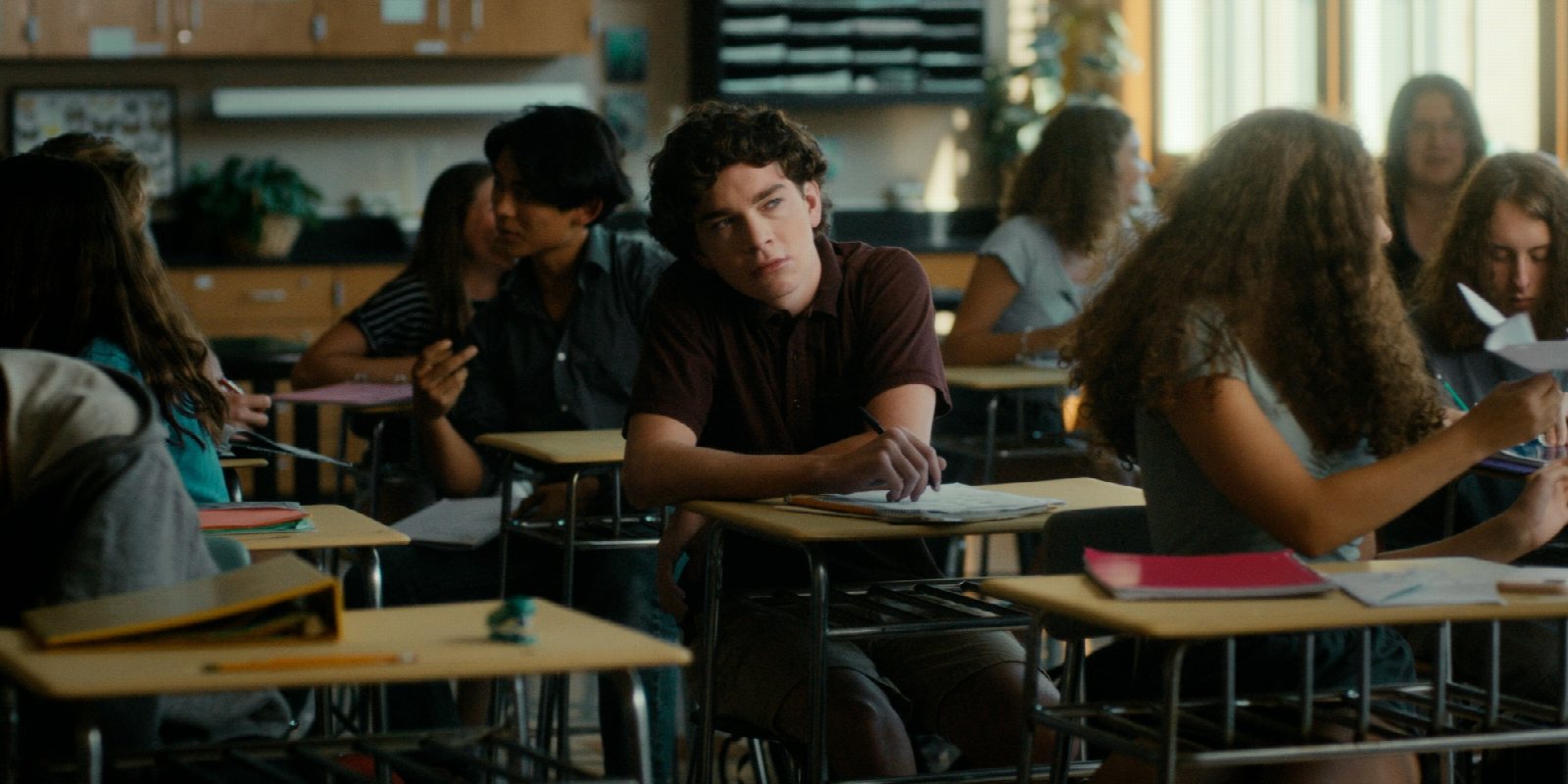 Kyle Sims on set of Galapagos in a high school bathroom location
